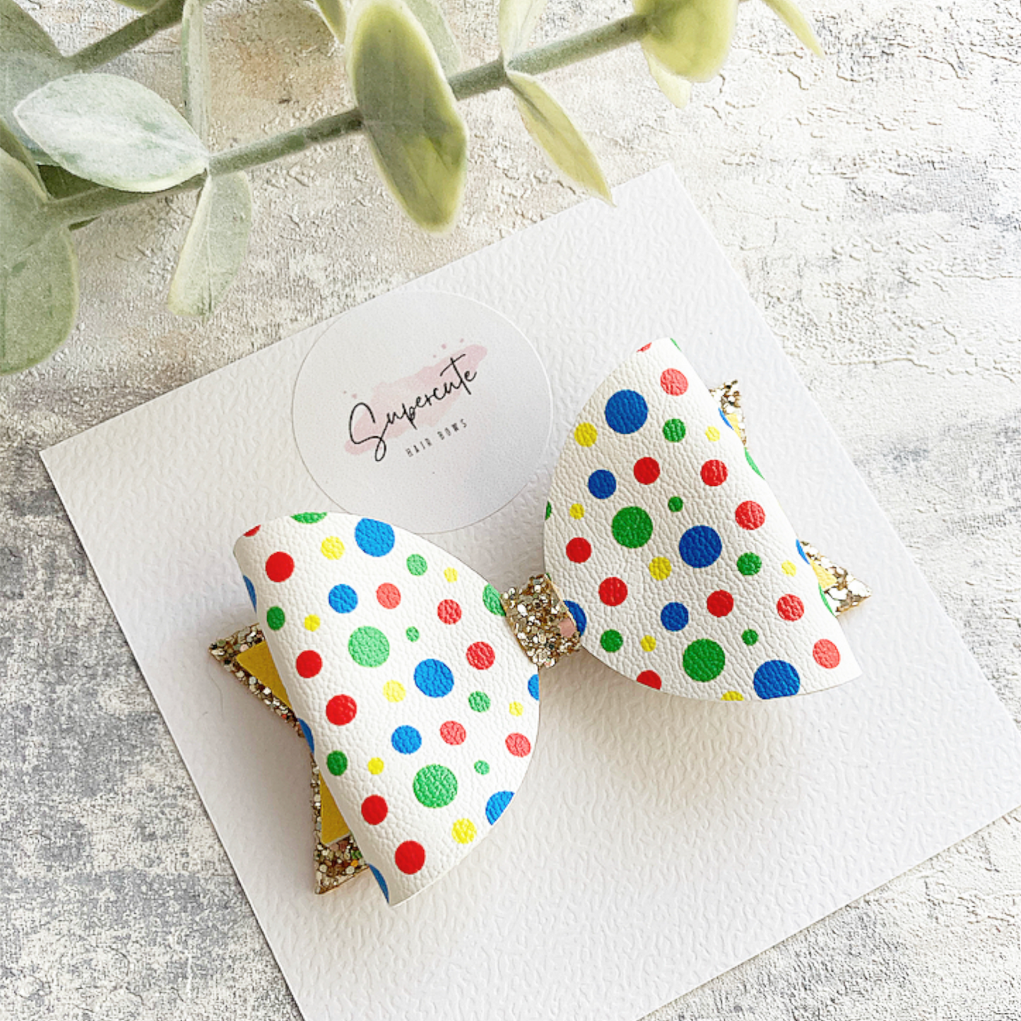 Spotty Leatherette Hair Bow
