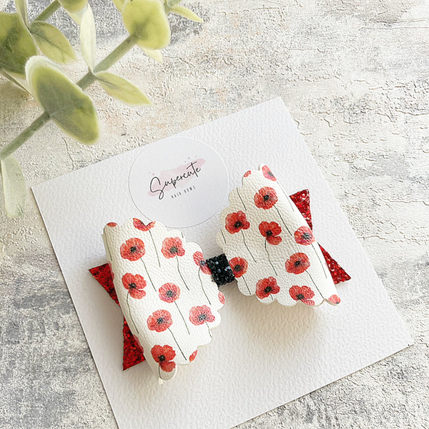Poppy Leatherette Hair Bow
