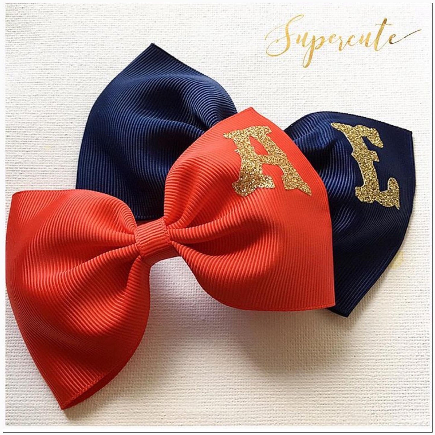 Large Initial Ribbon Pinch Bow